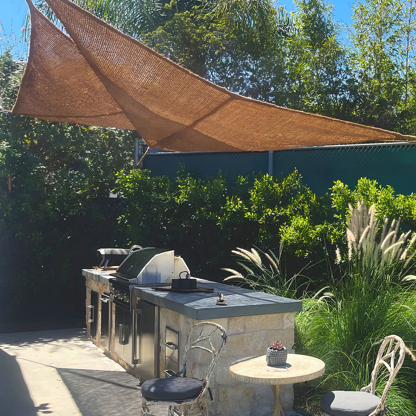 12' x 12' x 12' triangle coconut fibre shade sail natural fibers handmade artisan outdoor bbq kitchen stone europe vibes non toxic woven coconut yarn coco du sol chic living 