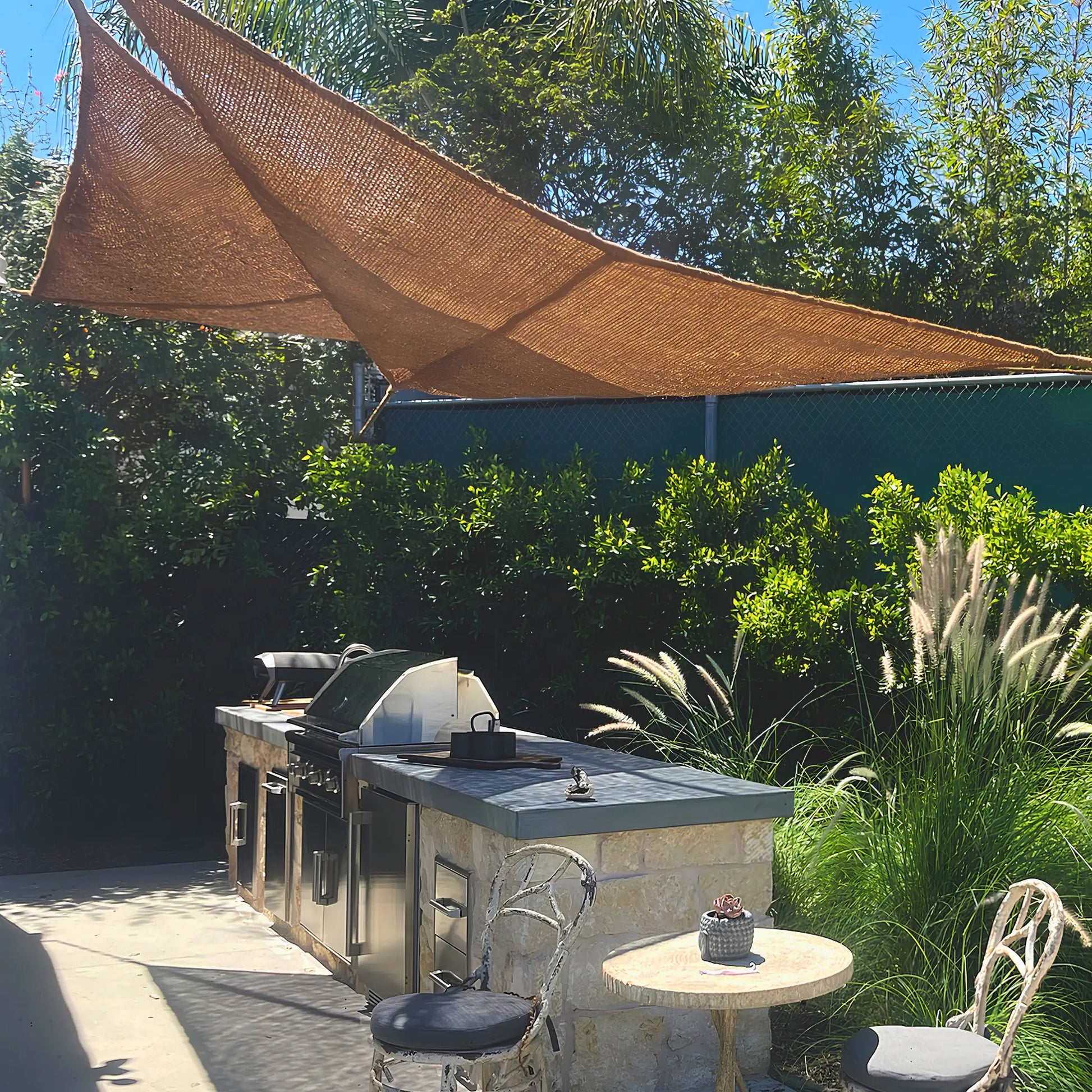 12' x 12' x 12' triangle coconut fibre shade sail natural fibers handmade artisan outdoor bbq kitchen stone europe vibes non toxic woven coconut yarn coco du sol chic living 
