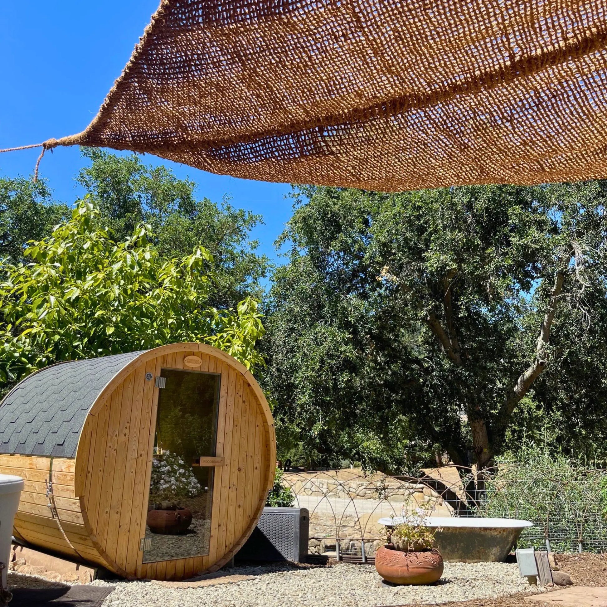 12' x 12' x 12' triangle coconut fibre shade sail natural fibers handmade artisan non toxic garden wellness vibes sauna ojai patio coco du sol chic living 