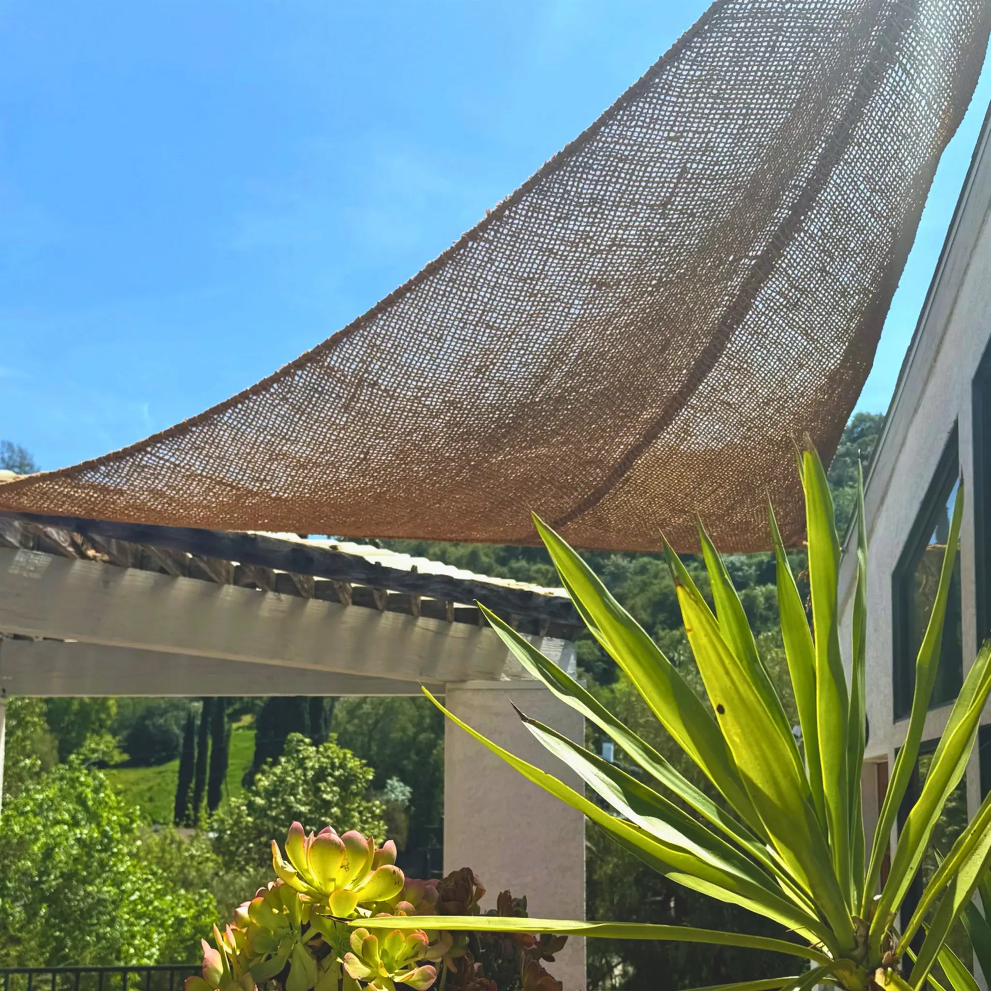 Natural shade sail and white pergola rustic  handwoven fibre made from coconut fibre breathable 