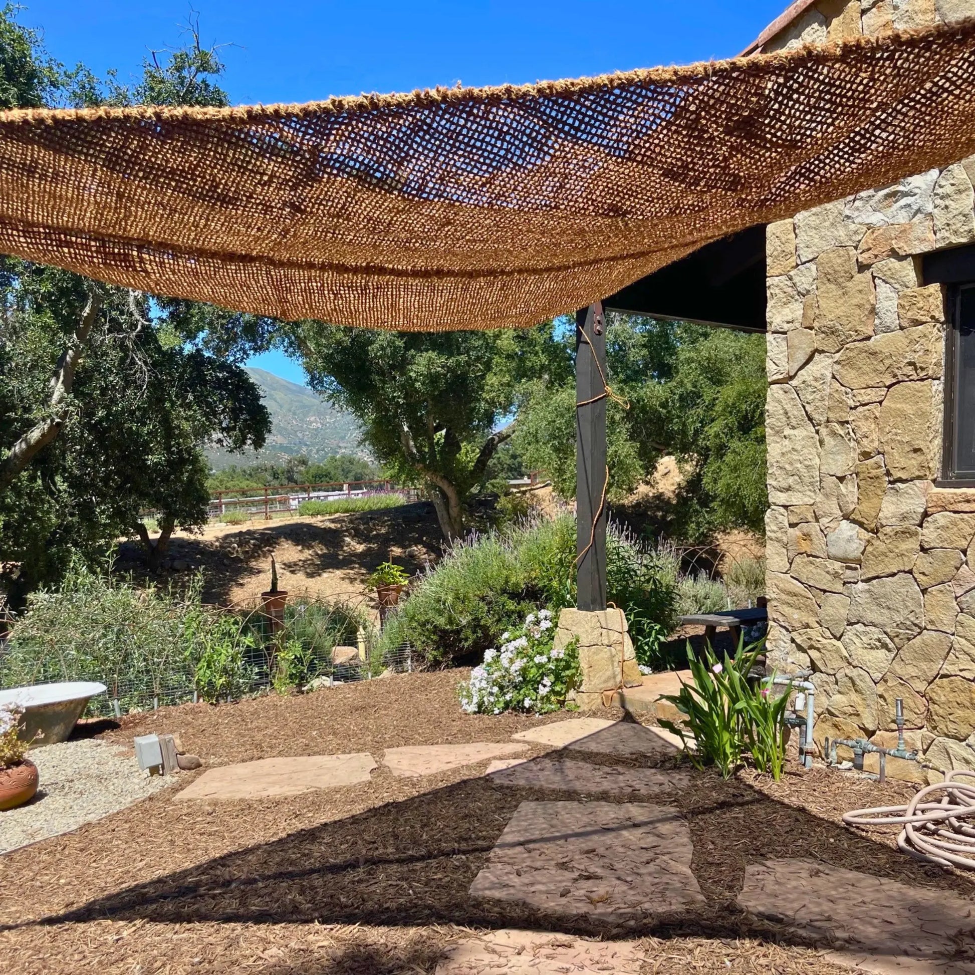 12' x 12' x 12' triangle coconut fibre shade sail natural fibers handmade artisan europe rustic vibes non toxic coco du sol chic living 